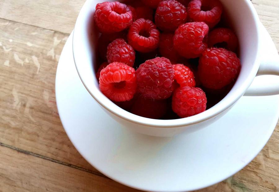 Fresh raspberries in a ceramic cup from the Verdi packaging shoot